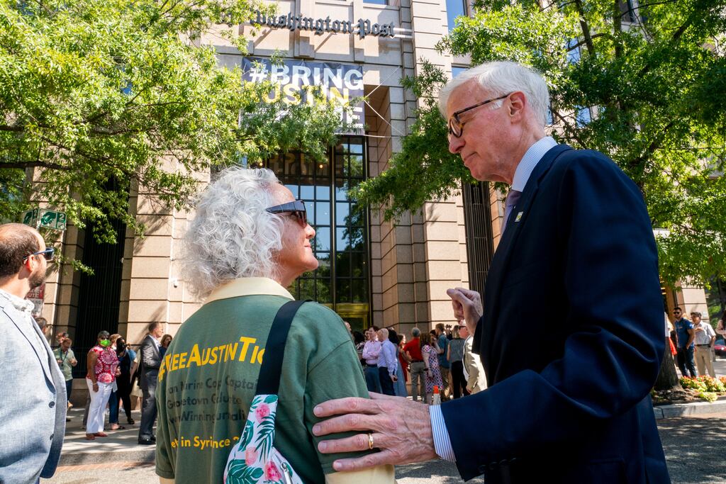 Debra Tice, mother of Austin Tice, speaks to Washington Post publisher and chief executive Fred Ryan during the unveiling of a #BRINGAUSTINHOME banner hanging from the newspaper's headquarters in Washington, DC. Photograph: Shawn Thew/Shutterstock