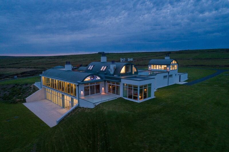 The home at night.