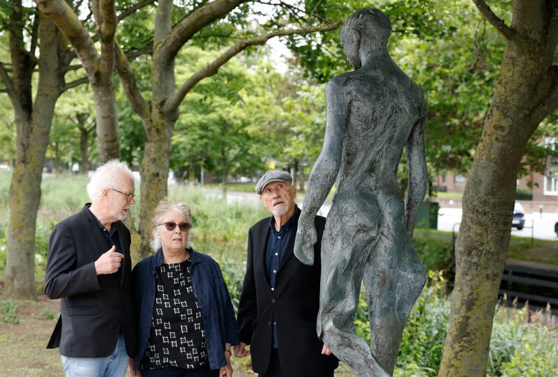 RHA's Patrick T Murphy, sculptor Carolyn Mulholland, David Crone and her piece Man on Trestle near Leeson Street bridge. Photograph: Nick Bradshaw/ The Irish Times  

