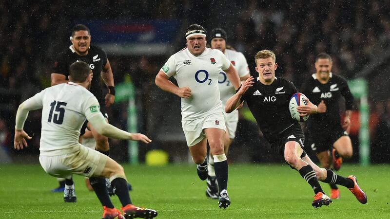 New Zealand fullback Damian McKenzie  makes a break during the autumn international against  England  at Twickenham. Photograph: Glyn Kirk/AFP/Getty Images