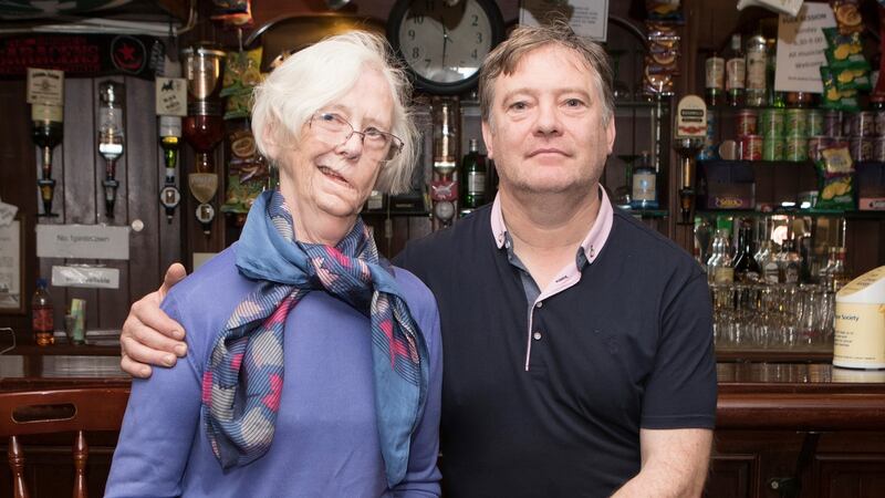 Patrick O’Kelly of the Silver Dollar  with his mother  Margaret. “My mother will say when she was growing up here there was 56 pubs in Newcastle West.” Photograph Liam Burke/Press 22