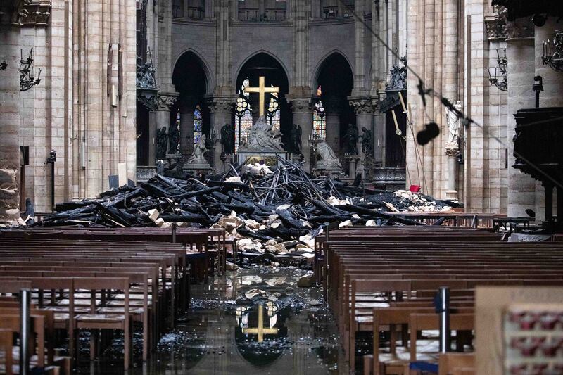 Fallen debris from the burnt-out roof structure sits near the altar inside Notre Dame cathedral on April 16th, 2019.  Photograph: Christophe Morin/Bloomberg via Getty Images