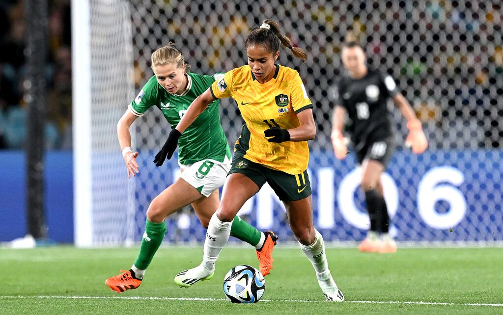 Mary Fowler of Australia holds off Ruesha Littlejohn of Ireland during the opening match of the 2023 Women's World Cup at Stadium Australia in Sydney. Photograph: Bradley Kanaris/Getty Images