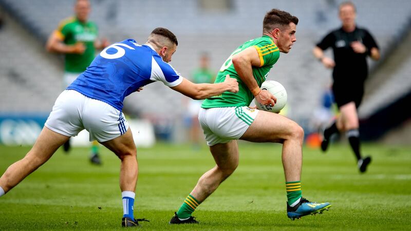 Meath’s Donal Keogan and Robert Pigott of Laois during their Leinster  Championship semi-final match at Croke Park, Dublin, on Sunday.  Photograph: Ryan Byrne/Inpho