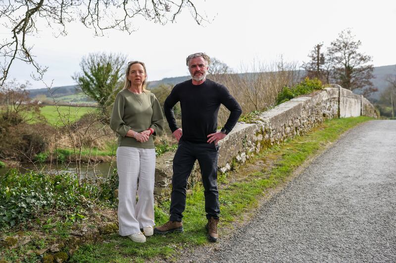 Danielle and Mike English on Killardry Bridge near Kilmoyer, Tipperary, where their daughter Bronagh died. Photograph: Enda O'Dowd