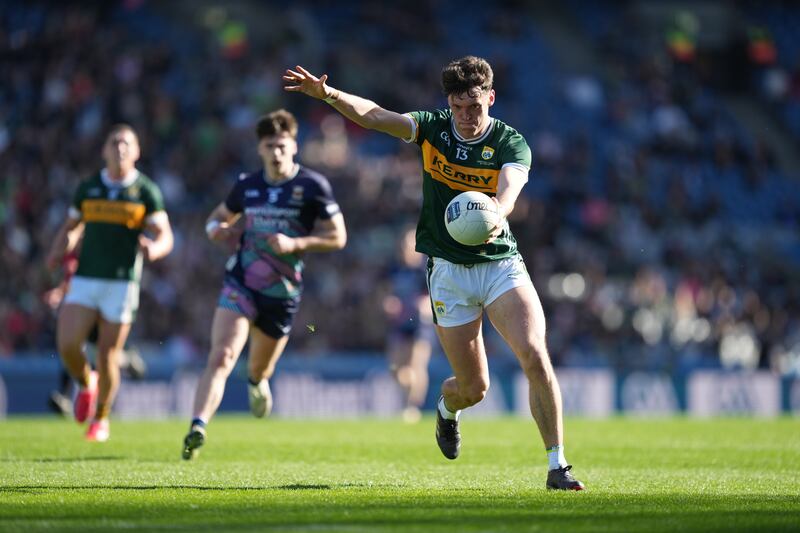 David Clifford of Kerry kicks a point. Photograph: James Lawlor/iNPHO