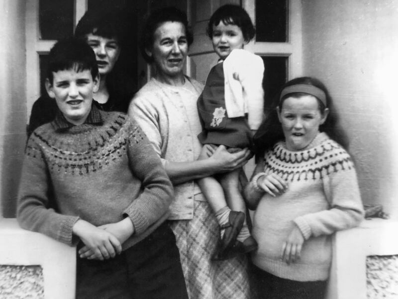 Mary, far right, her brothers Dermot (foreground) and John, her mother and sister Sinead.