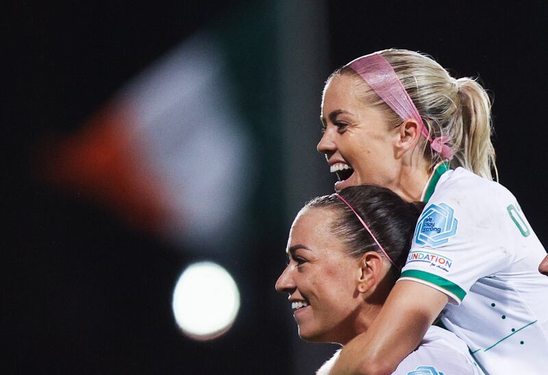 Katie McCabe celebrates with Denise O'Sullivan after completing her hat-trick by scoring the Republic of Ireland's fifth goal against Albania at Tallaght Stadium. Photograph: Tom Maher/Inpho 