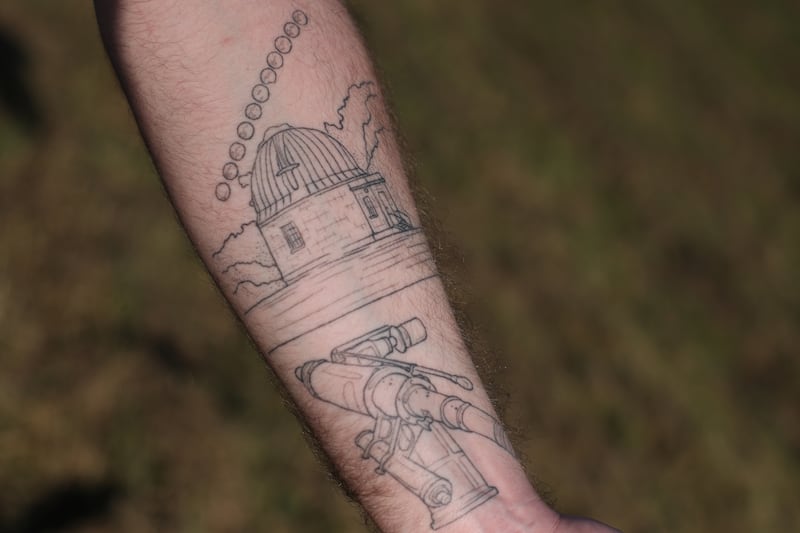 Jacob Byrne, 29, shows his tattoo of Dunsink Observatory. Photo: Clodagh Kilcoyne for The Irish Times