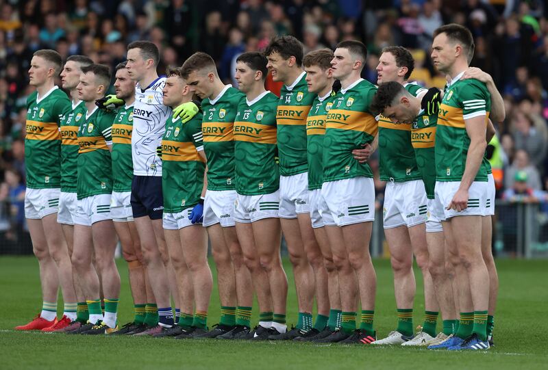 Before the Munster football championship final the Kerry team observes a minute's silence in memory of team-mates David's and Paudie's mother, Ellen Clifford. Photograph: Inpho