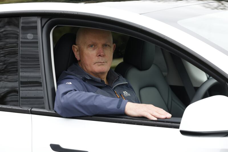 Tesla owner Tim McCarthy: 'I would be worried about the resale value now, and that might actually encourage me to hold on to the car for longer.' Photograph: Nick Bradshaw 