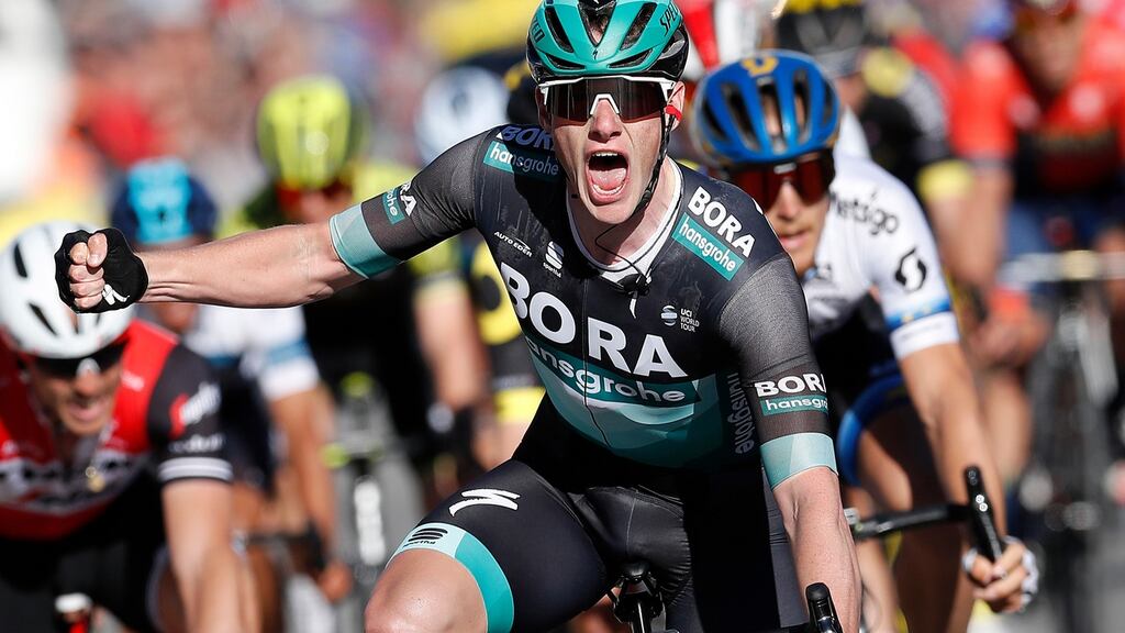 Irish rider Sam Bennett of Bora-Hansgrohe celebrates winning the sixth stage of the Paris-Nice race from Peynier to Brignoles, France. Photograph: Sebastien Nogier/EPA