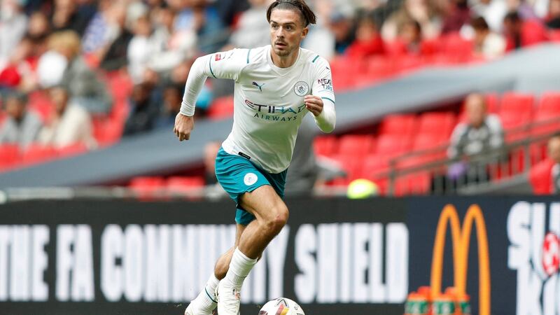 Jack Grealish runs with the ball after making his Manchester Cirty debut in the second half of the Community Shield at Wembley. Photograph: Adrian Dennis/AFP via Getty Images