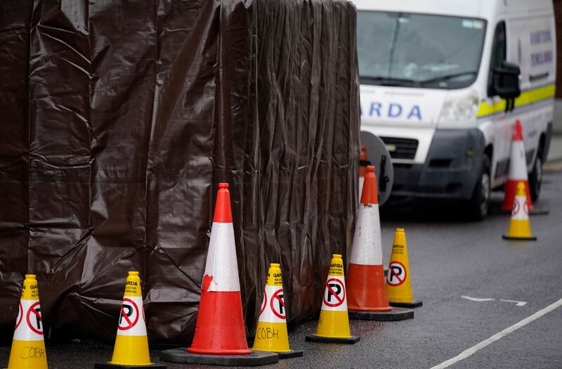 Garda vehicles parked near a property in Youghal which was being searched in the case of missing woman Tina Satchwell. Photograph: Niall Carson/PA Wire
