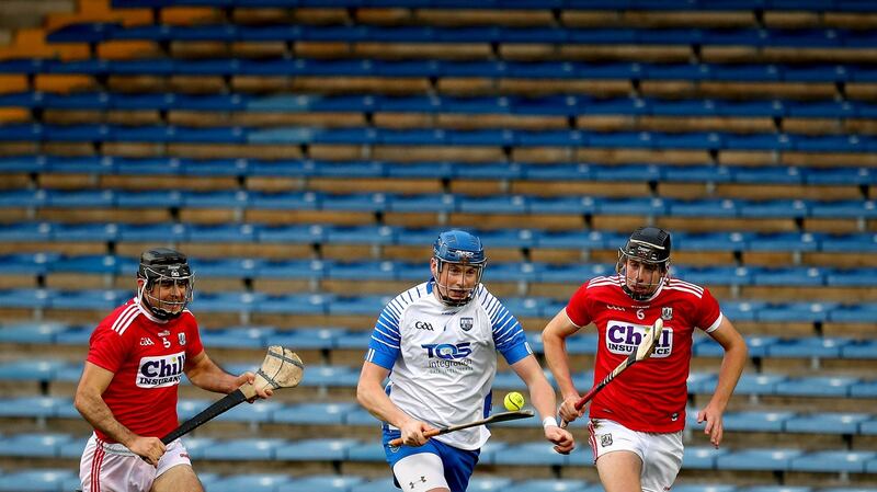 Christopher Joyce and Robert Downey chase Austin Gleeson. Photo: Ryan Byrne/Inpho