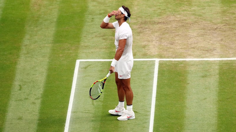 Rafael Nadal reacts during his semi-final defeat to  Novak Djokovic at Wimbledon. John Walton/EPA