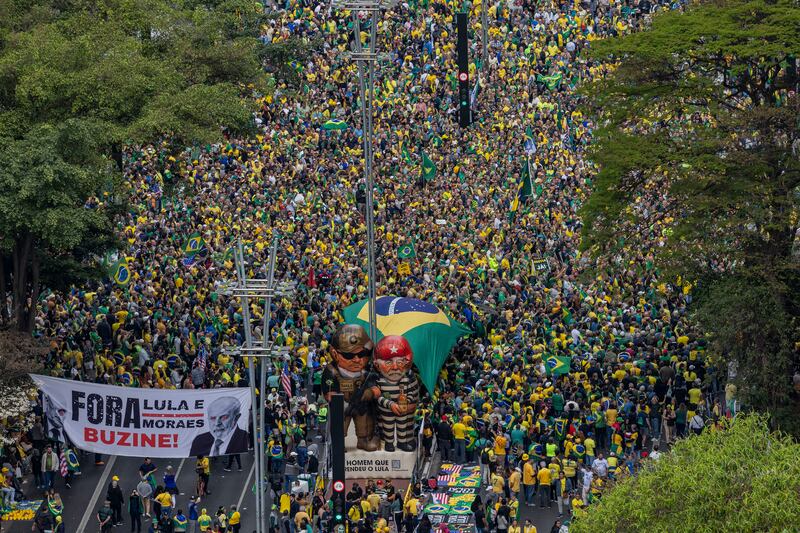 Supporters of former president Jair Bolsonaro gather in São Paulo on Sunday. Photograph: Victor Moriyama/New York Times
                      