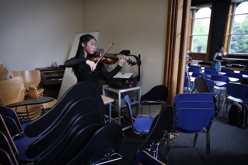 Lily Yang (13) rehearses before competing at DCU/ All Hallows in Dublin’s Drumcondra in the annual Feis Ceoil.  Photo: Bryan O’Brien / The Irish Times 
