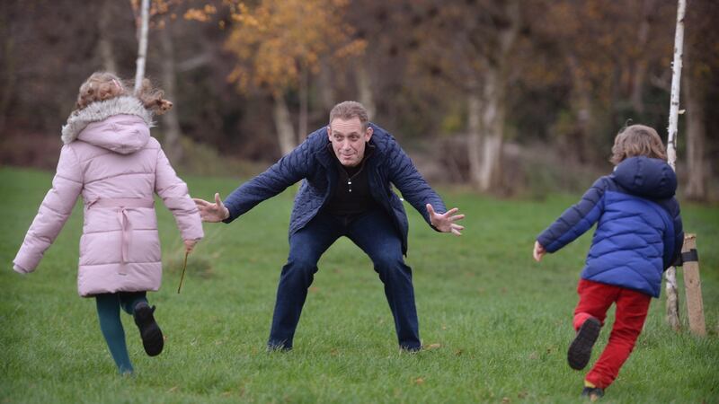 Dr Matt Widdowson, at home with his children Aoife and Eoin, in Dublin. Photograph: Dara Mac Dónaill