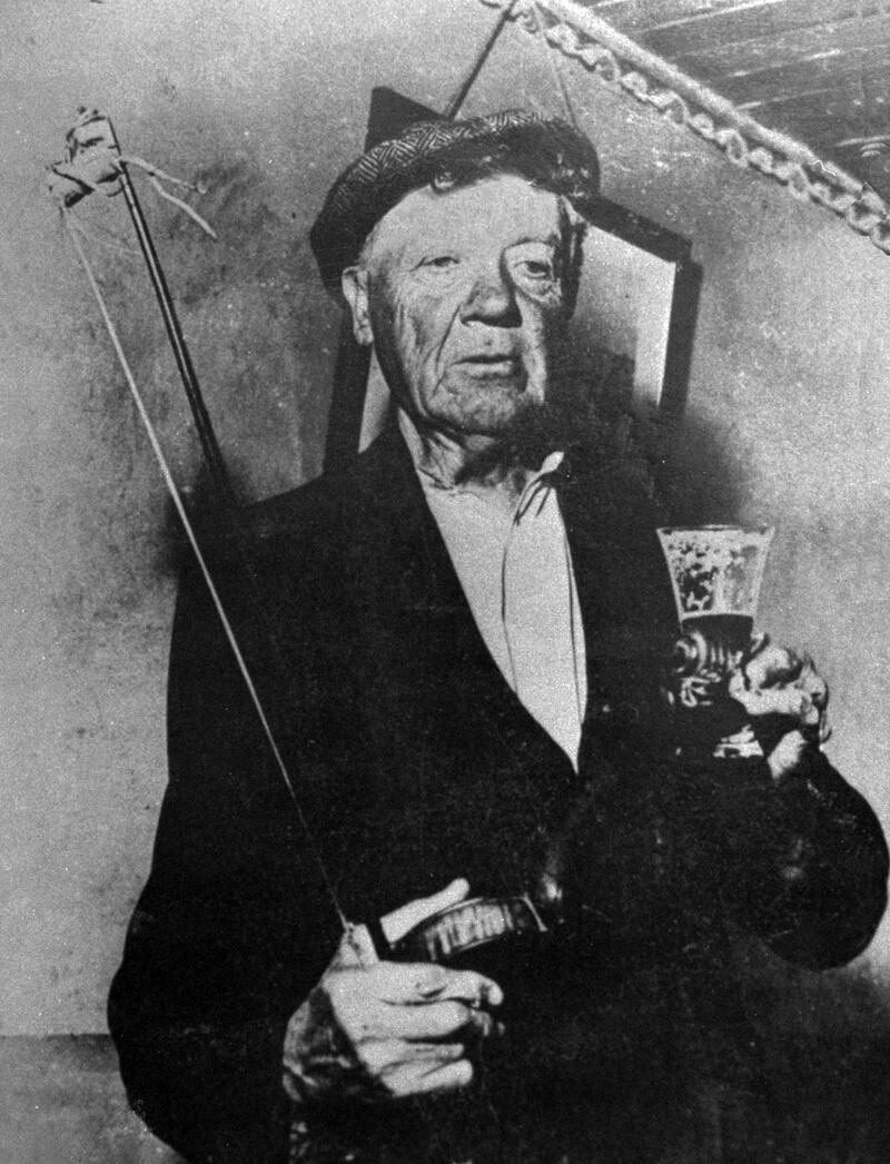 Patrick O'Keeffe pictured in 1955: the photograph, taken by Liam Clancy, hangs in Lyons' Bar in Scartaglin, Co Kerry.