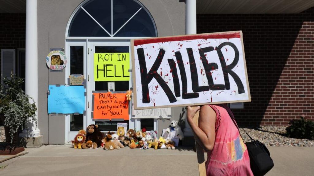 Protesters outside Walter Palmer’s dental practice after the killing of Cecil the lion. Photograph: Adam Bettcher/Getty Images