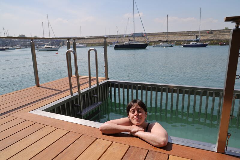 Reporter Niamh Browne cools down with a plunge after her sauna. Photograph: Bryan O’Brien