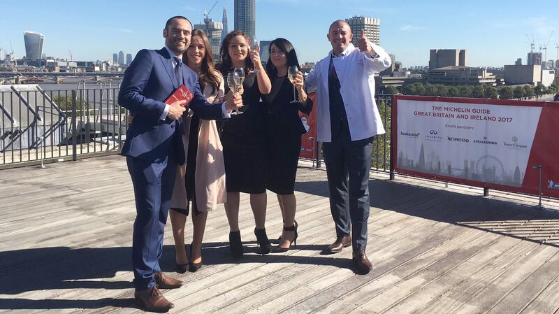 Andrew Heron and Damien Grey with their wives, Claudia and Jessica, and chef Róisín Gillen after the Michelin awards ceremony in London in October