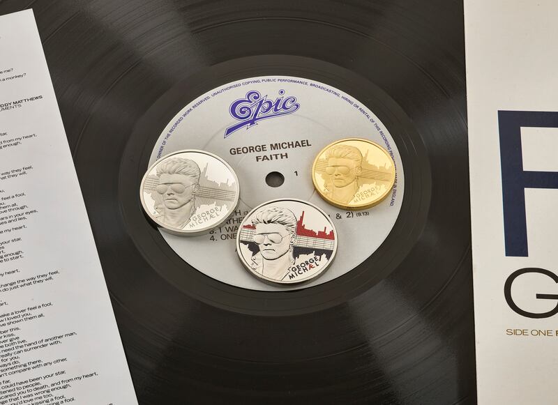 Undated handout photo issued by the Royal Mint of their new George Michael Coin in its limited-edition precious metal proof finishes, Brilliant Uncirculated and colour versions. The Royal Mint unveils a new collectable coin celebrating the British singer-songwriter. Designed by artist and sculptor Sandra Deiana, the coin portrays the singer wearing his trademark sunglasses and an engraving of the refrain of "Faith".  Issue date: Monday February 26, 2024. PA Photo. See PA story MONEY Coin. Photo credit should read: Royal Mint/PA Wire 

NOTE TO EDITORS: This handout photo may only be used in for editorial reporting purposes for the contemporaneous illustration of events, things or the people in the image or facts mentioned in the caption. Reuse of the picture may require further permission from the copyright holder. 
