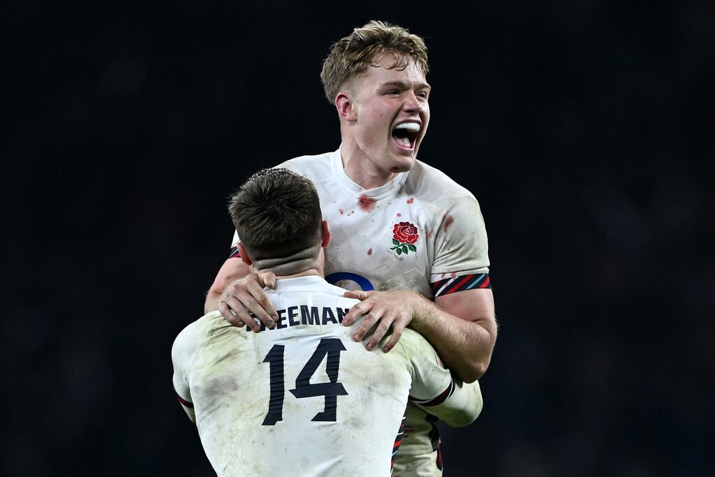 England's Fin Smith celebrates with Tommy Freeman after his conversion to beat France. Photograph: Shaun Botterill/Getty Images