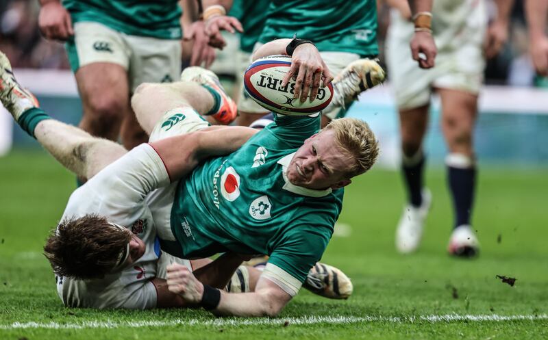Ireland's Jamie Osborne goes over for a try against England. Photograph: Inpho