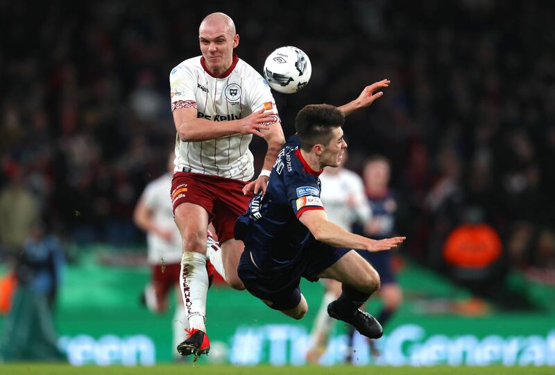 Bohemians' Georgie Kelly with Lee Desmond of St Pat's during the 2021 FAI Cup final at the Aviva Stadium. Photograph: Evan Treacy/Inpho