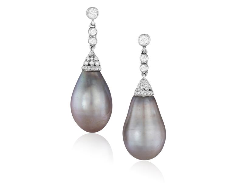 Certified natural saltwater pearls inset into a pair of early 20th century pearl and diamond pendent earrings (€25,000 - €35,000)