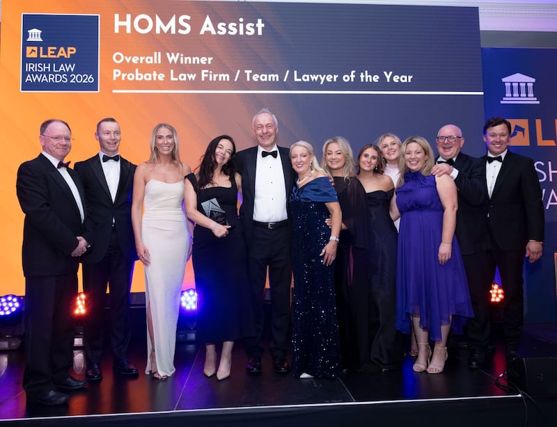 Richard Hammond, solicitor and partner at Hammond Good and chair of the judging panel of the Leap Irish Law Awards; Sean Fitzgerald, solicitor at HOMS Assist; Olga Sandys, solicitor at HOMS Assist; Claire Tuohy, partner at HOMS Assist; Robert Bourke, solicitor at HOMS Assist; Ita Barrett, office manager at HOMS Assist; Clíodhna Finnin, solicitor at HOMS Assist; Áine McSweeney, solicitor at HOMS Assist; Sorcha Nagle, solicitor at HOMS Assist; Marie Moloney, solicitor at HOMS Assist; William Donovan, solicitor at HOMS Assist; and Anton Savage, MC of the night. Photograph: Paul Sherwood