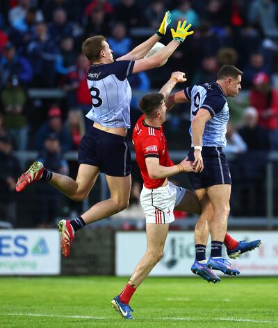 Dublin’s Peadar Ó Cofaigh Byrne and Brian Howard with Dara McDonnell of Louth in the Leinster football semi-final this year. Photograph: INPHO/James Crombie