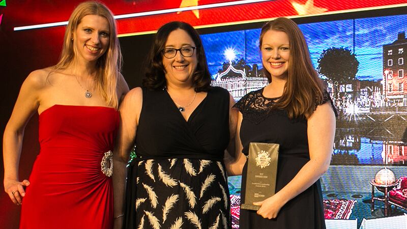 Brian C. O'Reilly, Managing Director, MCE Events presents the Best Exhibition award to Lucy Ryan & Brian Ingarfield, IN SIGHT.