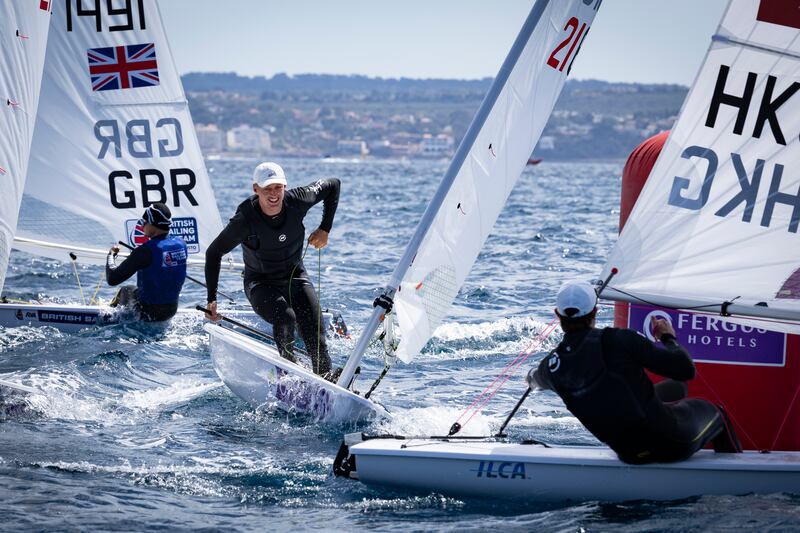Ireland’s Ewan McMahon battling his way to the front of the ILCA 7 men’s one-person dinghy event at the Princess Sofia Trophy in Palma. Photograph:  David Branigan/Oceansport