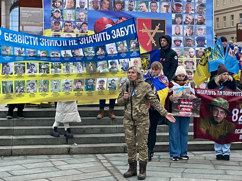 Hanna Kravchenko addresses a rally of relatives of missing Ukrainian servicemen on Maidan square in central Kyiv. Photograph: Daniel McLaughlin
