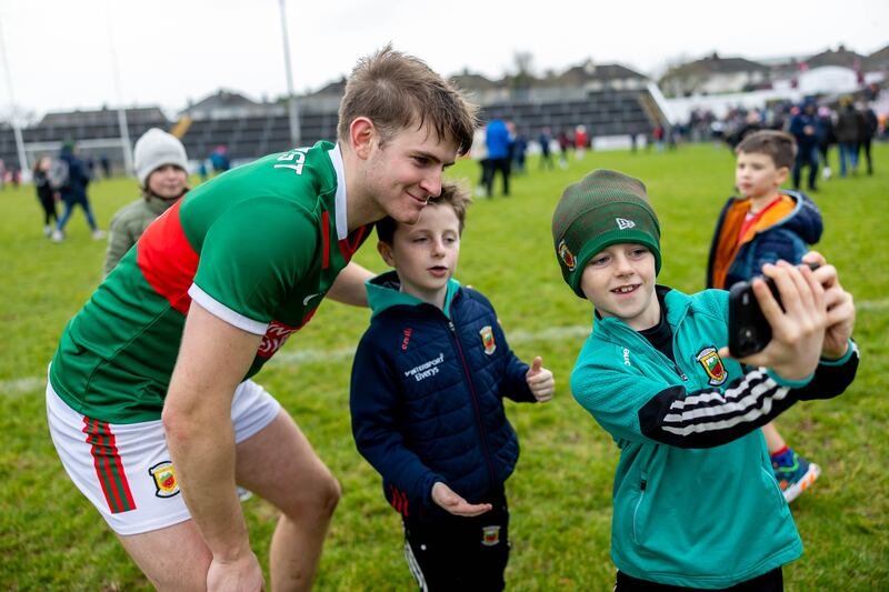 Rory Brickenden of Mayo meets young supporters after the game against Galway. Photograph: Morgan Treacy/Inpho