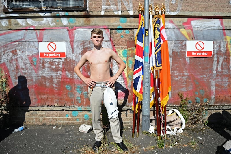 A member of a flute band prepares to take part in the annual Twelfth of July parade. Photograph: Charles McQuillan/Getty