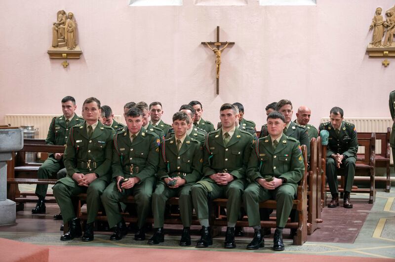 Colleagues of Trooper Shane Kearney attend a church service in Killeagh, Co Cork for their the 22-year-old who was injured during an attack in Lebanon on Wednesday. Photograph: Michael Mac Sweeney/Provision