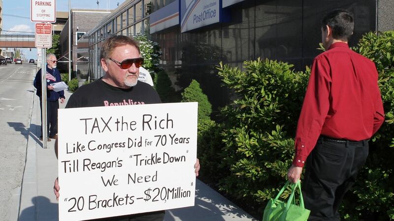 James Hodgkinson, who has been identified as the shooter of  Steve Scalise, protests outside of the United States Post Office in  Belleville, Illinois, in this April 2012 image. File photograph: Derik Holtmann/Belleville News-Democrat, via AP