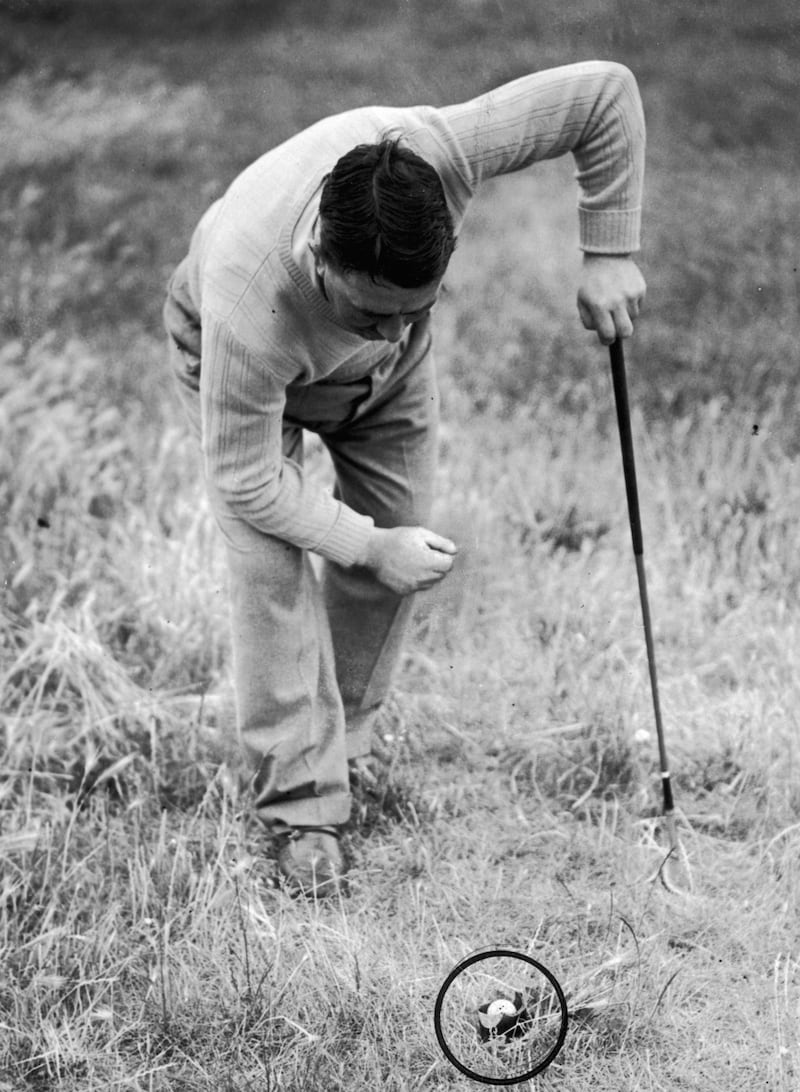 Ireland’s Harry Bradshaw finds his ball inside a broken bottle in the rough at the fifth hole, during the Open Championship at the Royal St George’s golf course in 1949. Photograph: Keystone/Hulton Archive/Getty Images