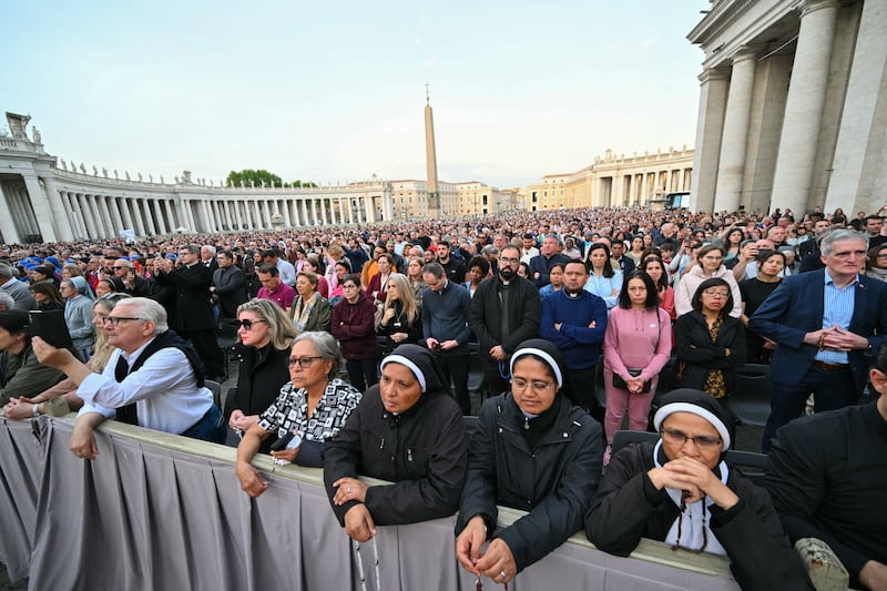 Devotees attend a Rosary in suffrage to Pope Francis following his death in Saint Peter's Square Monday evening.
Photograph: Andreas Solaro/AFP via Getty Images
