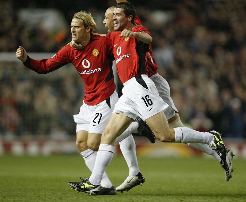 Diego Forlán with team-mate Roy Keane during their time at Manchester United. Photograph: Laurence Griffiths/Getty Images