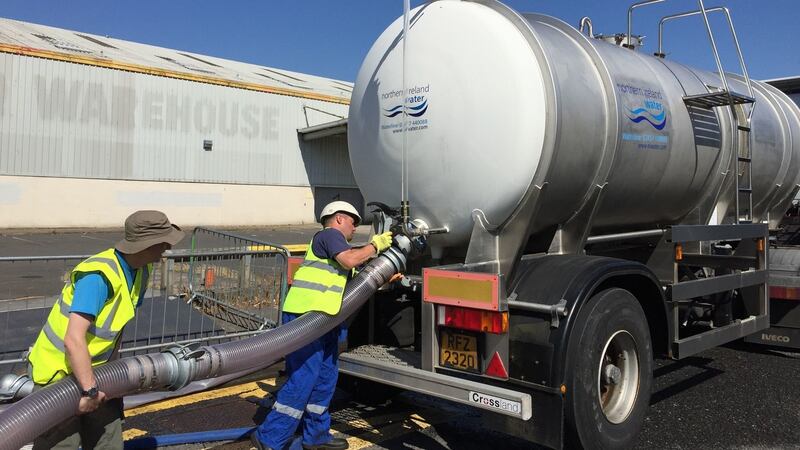Northern Ireland Water workers filling a tanker from the mains in south Belfast before transporting to top up a low level reservoir this week. Photograph: David Young/PA Wire