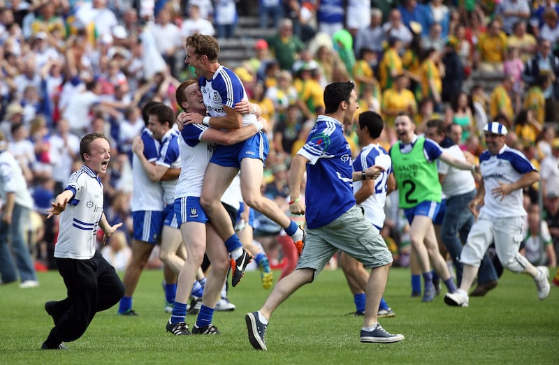 Monaghan players are mobbed by ecstatic supporters after the Ulster final win against Donegal in 2013. Photograph: William Cherry/Presseye/Inpho