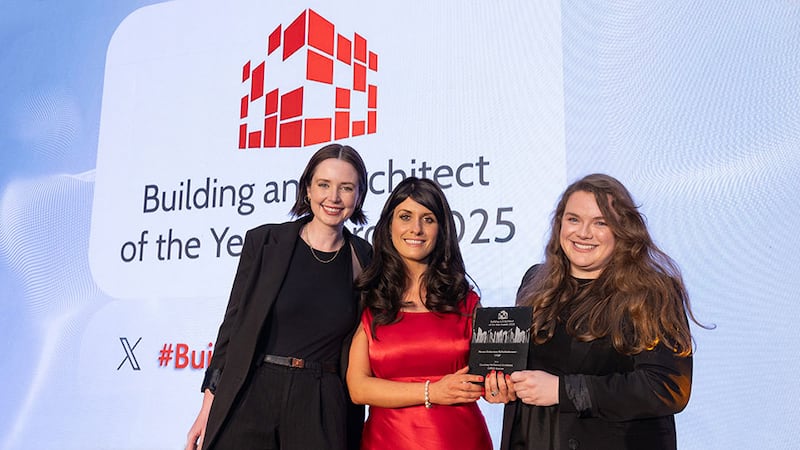 Sophie Lordan, customer service manager of Texfel, presents the house extension refurbishment - large award to Julie Molloy and Aoife Grogan, Courtney McDonnell Architects