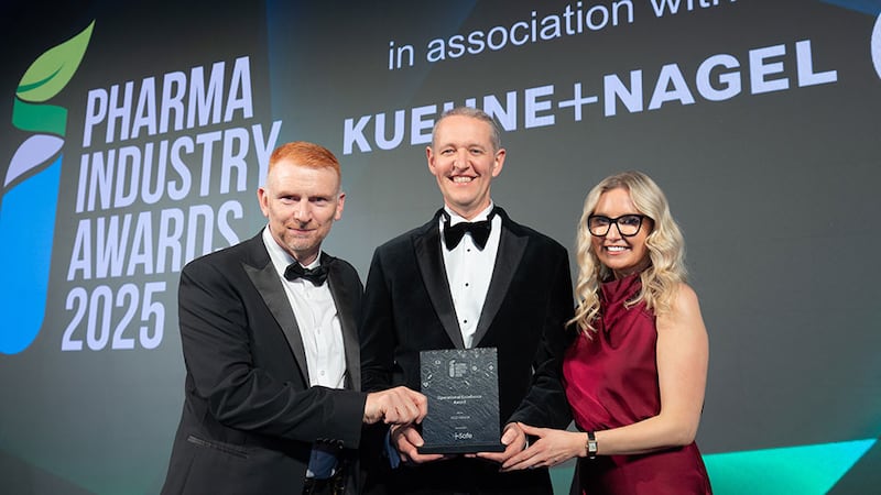 John Bullon, snr director of sales at CSafe, presents the operational excellence award to Jason Cawley and Sarah Curran, MSD Ireland