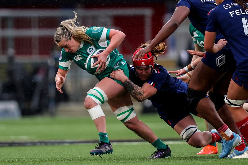 Ireland's Edel McMahon is tackles by France's Charlotte Escudero at Kingspan Stadium in their Six Nations game. Photograph: Ben Brady/Inpho