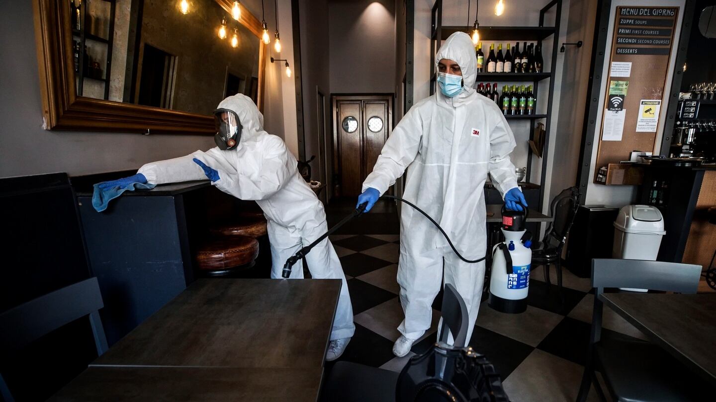 A restaurant in Rome is disinfected as on Tuesday Italy’s lockdown begins to be eased. Photograph: Angelo Carconi/EPA